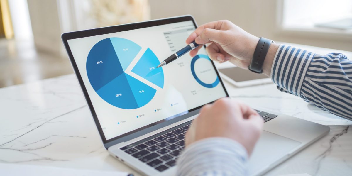 financier-uses-laptop-works-workplace-in-office-2026-01-08-22-34-03-utc